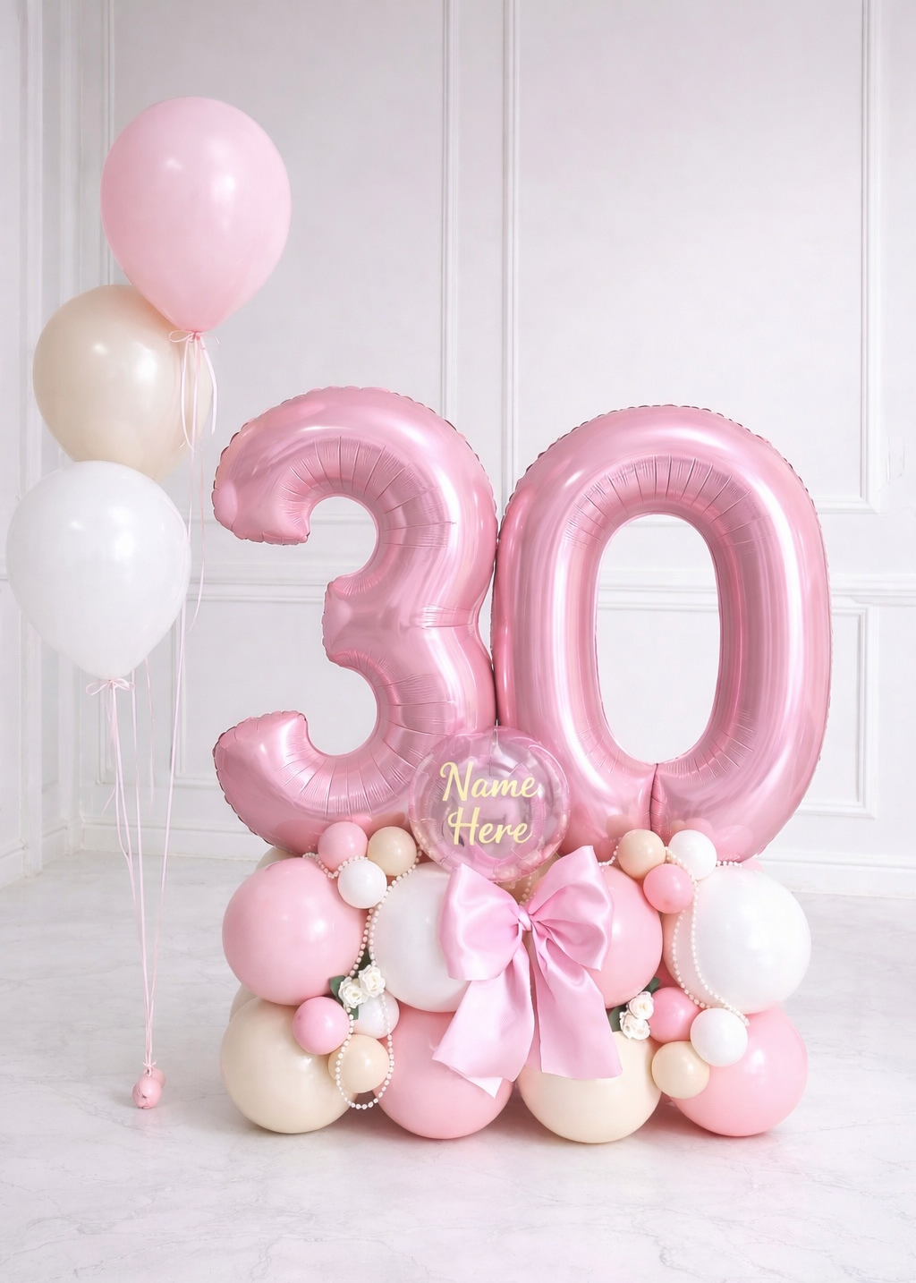 Luxury pink 33-inch birthday cake foil balloon bouquet with custom name and blush pink, white, champagne accents for milestone celebrations