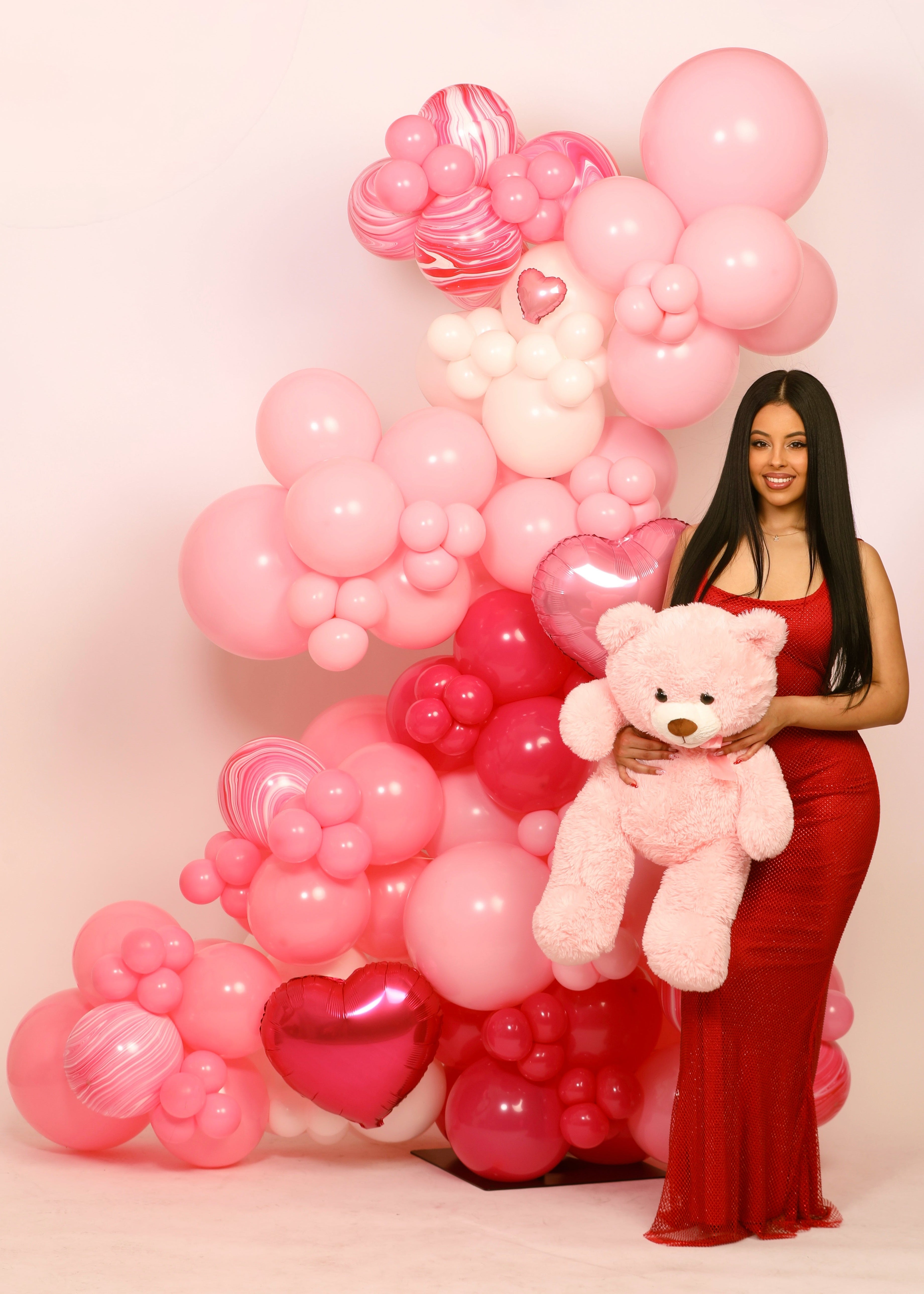 Luxury Galentine’s Day balloon garland backdrop for girls’ night celebration