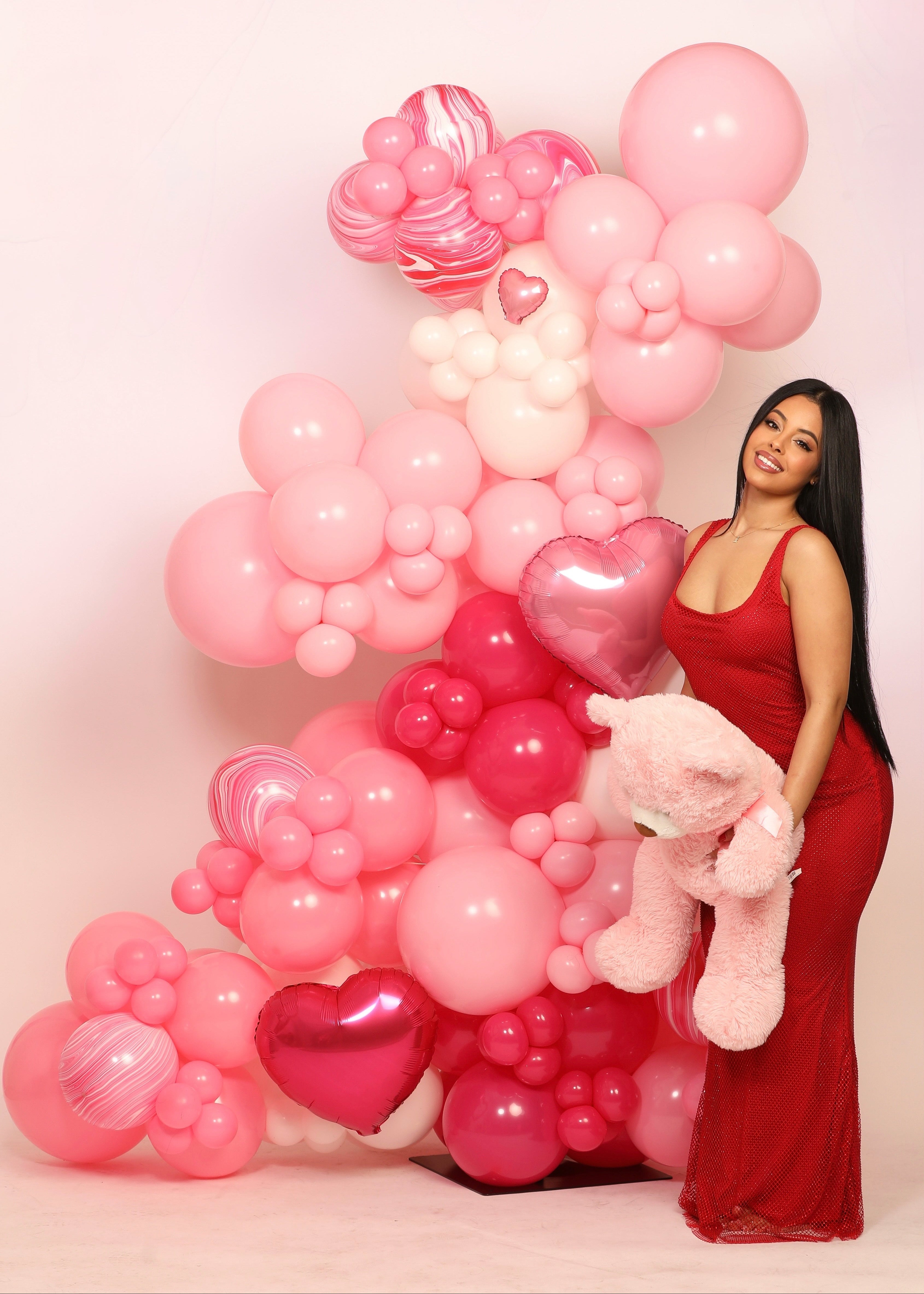 Luxury Galentine’s Day balloon garland backdrop for girls’ night celebration