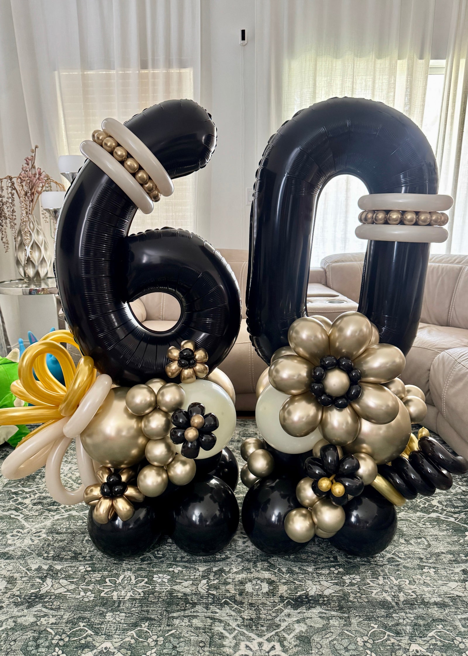 60th birthday balloon decoration
black gold birthday balloons
60 balloon numbers decoration
milestone birthday balloon display
elegant 60th birthday decor
black gold white balloon decor
birthday balloon centerpiece
luxury birthday balloon setup
60 birthday photo backdrop balloons
balloon numbers birthday decoration