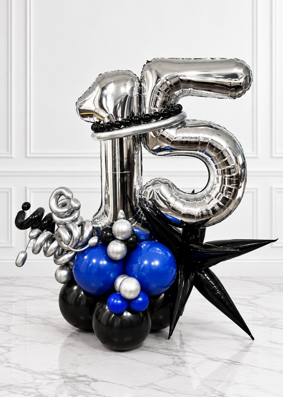 Luxury blue black and silver double number birthday balloon arrangement with metallic top hat and organic balloon base in Tampa