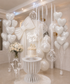 Elegant bridal shower balloon package with pearl white balloons and luxury décor setup in Tampa
