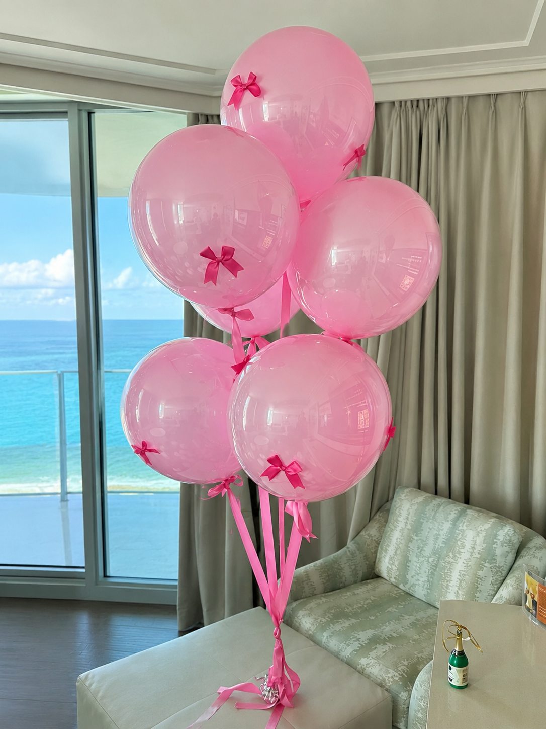 Luxury pink Bobo helium balloon bouquet with satin bows and pink ribbon in Tampa