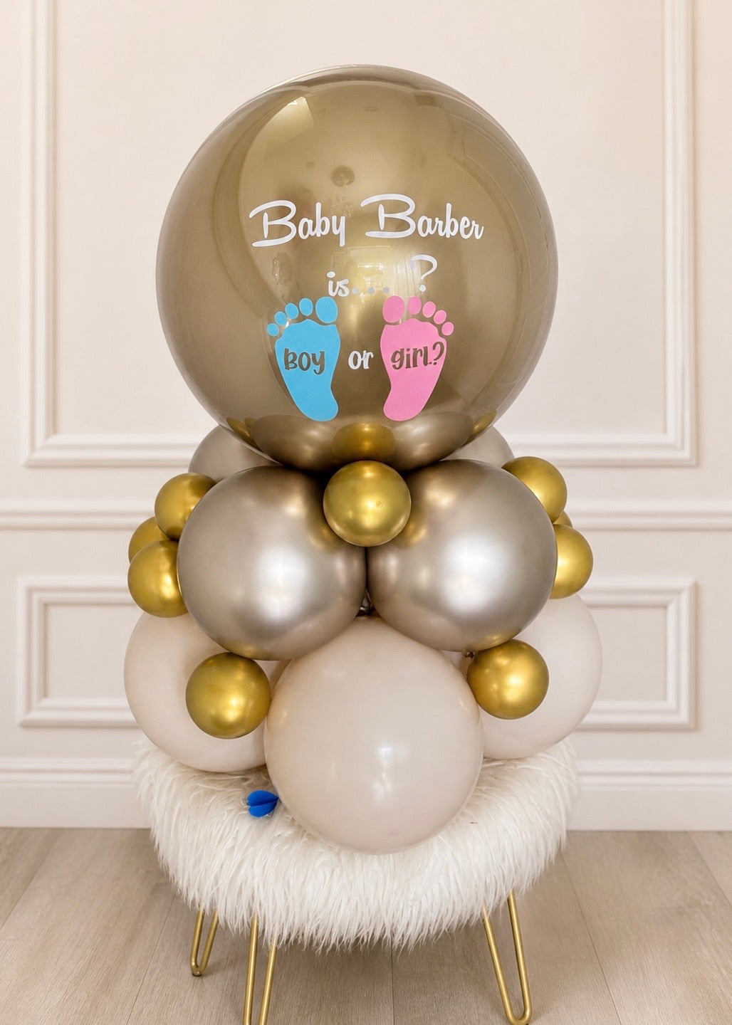 elegant gender reveal balloon arrangement neutral gold baby shower decoration centerpiece
boy or girl balloon centerpiece luxury baby shower decor champagne nude and gold balloons
custom gender reveal balloon display with neutral tones for baby shower table decor