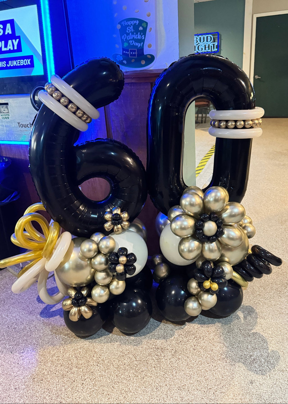 60th birthday balloon decoration
black gold birthday balloons
60 balloon numbers decoration
milestone birthday balloon display
elegant 60th birthday decor
black gold white balloon decor
birthday balloon centerpiece
luxury birthday balloon setup
60 birthday photo backdrop balloons
balloon numbers birthday decoration