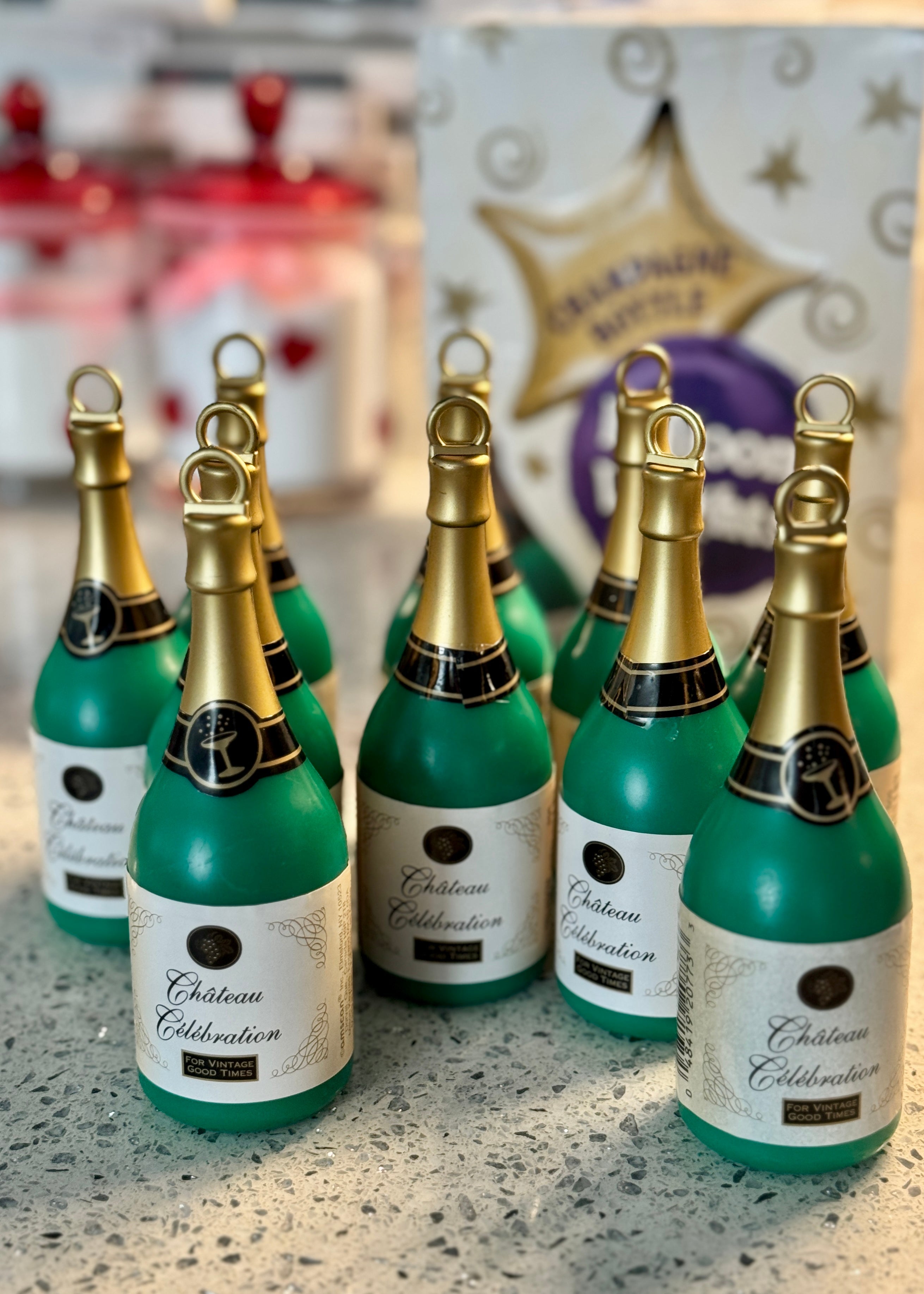 Weight Bubbly Wine Bottle 132g holding cluster of latex balloons for celebrations