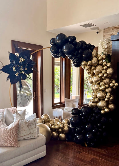 Black &amp; Gold Balloon Garland On Circle Arch with Boho Flower Arrangement