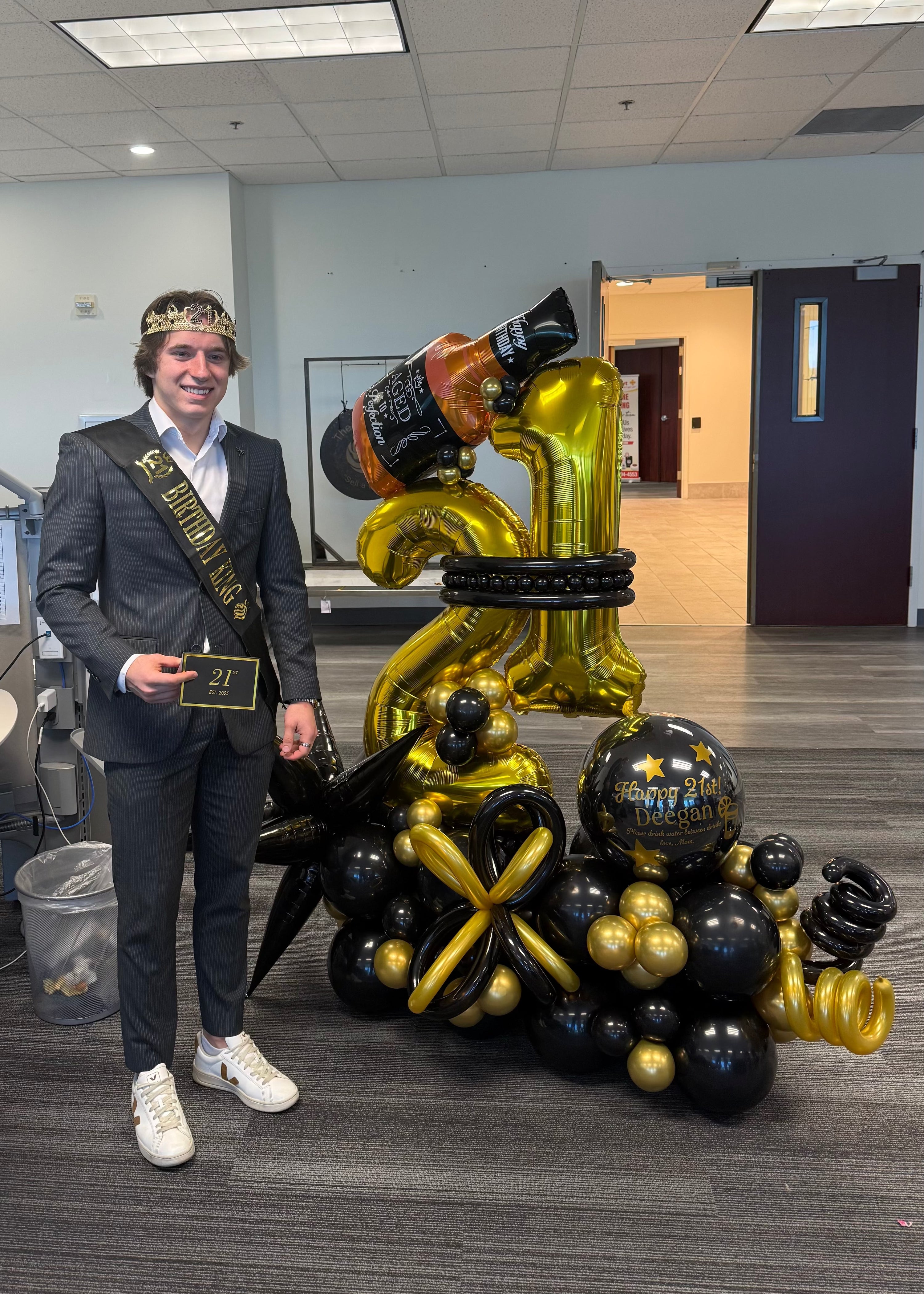 Custom number balloon bouquet with personalized BOBO balloon for birthday celebrations