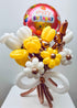 Surprise HBD Balloon Bouquet with yellow and white balloons shaped like flowers and a Happy Birthday foil balloon.