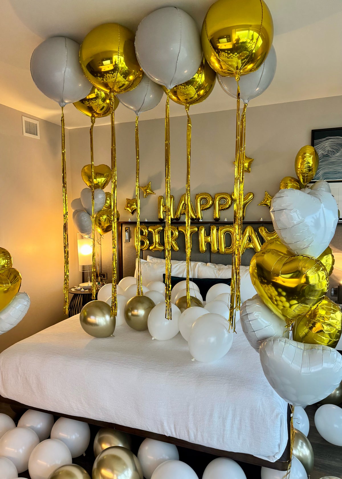 Happy Birthday balloon surprise setup with gold orbz Tampa