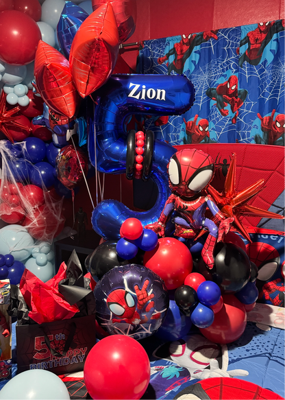 Spider-Man inspired birthday bedroom decoration with red and blue balloon garlands, helium balloons, personalized number balloon and kids birthday room setup in Tampa