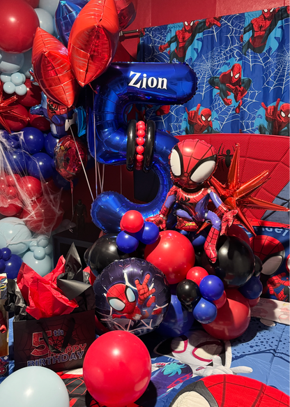 Spider-Man inspired birthday bedroom decoration with red and blue balloon garlands, helium balloons, personalized number balloon and kids birthday room setup in Tampa