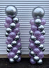 6ft tall spiral balloon columns in silver and purple for party decoration